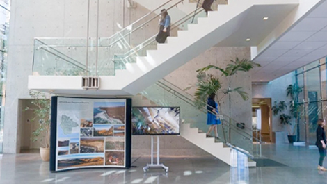 A staircase inside Esri Headquarters with people ascending and descending