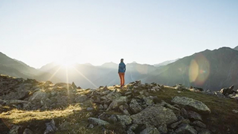 Person standing in a landscape