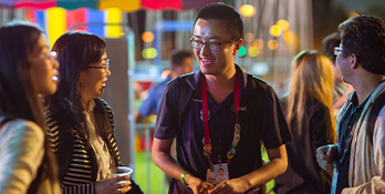 Esri Developer Summit attendees enjoying a social event