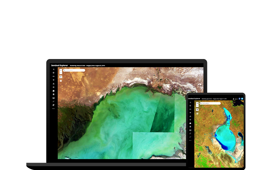 Colorful aerial photograph of the earth on a desktop display, with various colorful geometric patterns behind it