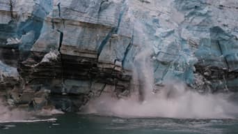 Image of an iceberg collapsing into the ocean