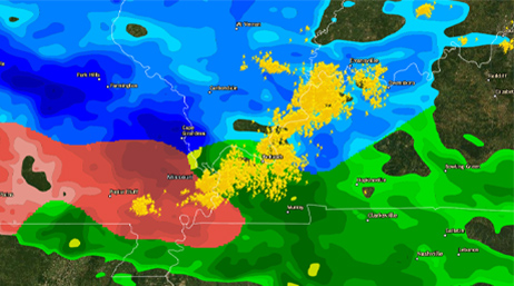 A map of the Midwest in the US showing weather patterns in red, blue, and green