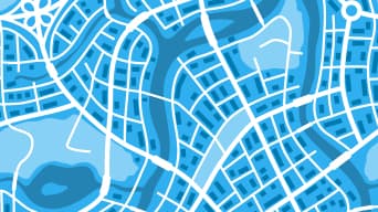 A blue map of a city with roads marked in white
