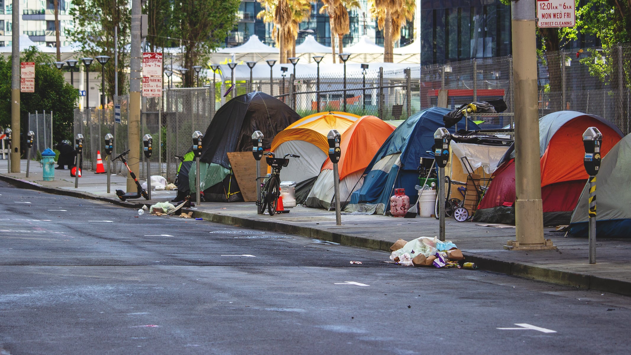 A homeless encampment along a city street