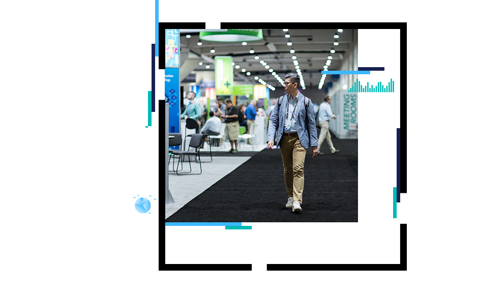 Person walking through a conference exhibit hall