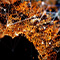An abstract image of scattered glowing gold lines overlaid with a network of geometric white lines against a black and blue background