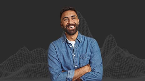 A smiling person a blue collared shirt with their arms crossed overlaid on a wireframe of a mountain range