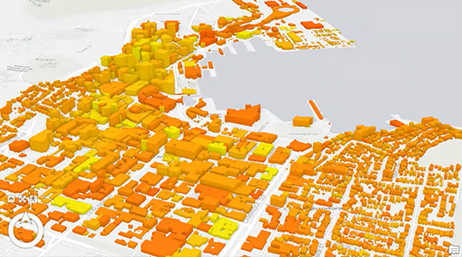 A digital 3D model of a city near a body of water